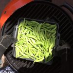 Placing the peas on the Stok grill pan