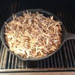 Grand Sapore wood chips added to skillet