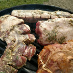 Leg and loin of lamb on the grill 