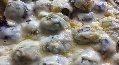 Our smoked Brussels sprouts with our creamy béchamel sauce make up this wonderful gratin. This is a great dish anytime but especially good around the holidays.