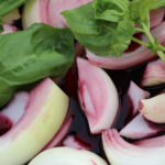 Our drip pan with Syrah wine, onions, garlic and fresh mint