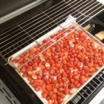 Strawberries on the gas grill with the double filet on the lite burner