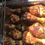 The cooking dry ribbed Chicken Drumsticks on the gas grill