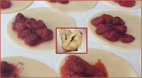 SMOKED STRAWBERRY HAND PIE being filled with the Stawberry mixture with the final result in the middle! yummy