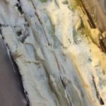 The layering of the leeks in the pan and goat chees filling