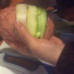 turkey wrapped avacado, now applying the zucchini outter wrap to hold everything together for grilling 