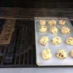 Our sheet pan of dough on the grill with wood flavor