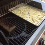 Our smoker box is all set on the lite side of the grill and the parsnips on the unlite! 