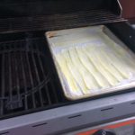 Zucchini Ribbons on the grill with wood chunks using a two zone cooking technique