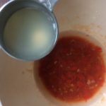 Adding our wet ingredients to the pepper mix 