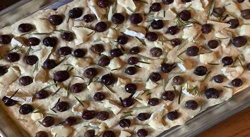 Our Delicious Smoked Grape Flatbread with Brie and a little fresh Rosemary